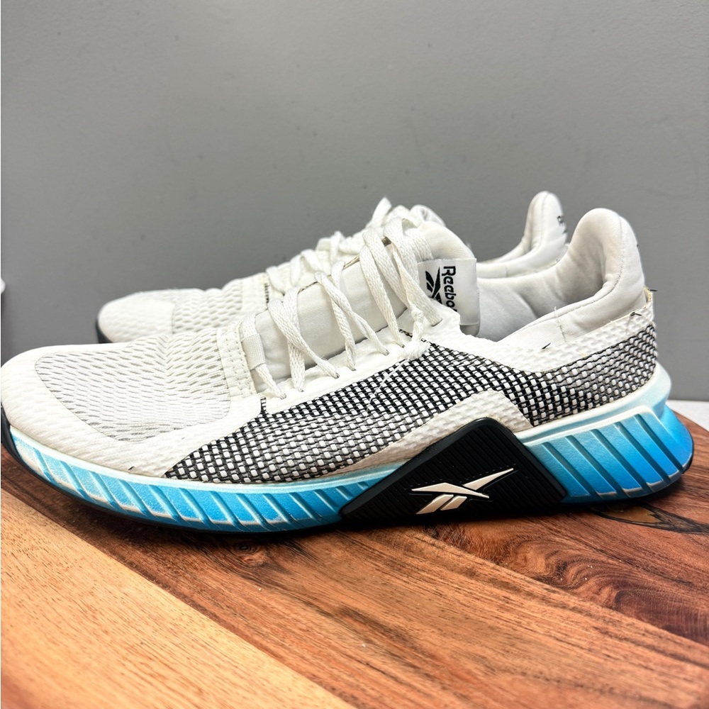 Reebok White and‎ Black Sneakers with Blue Sole